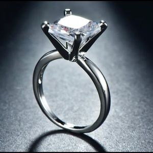 New-Princess cut White Sapphire Size 7 ring